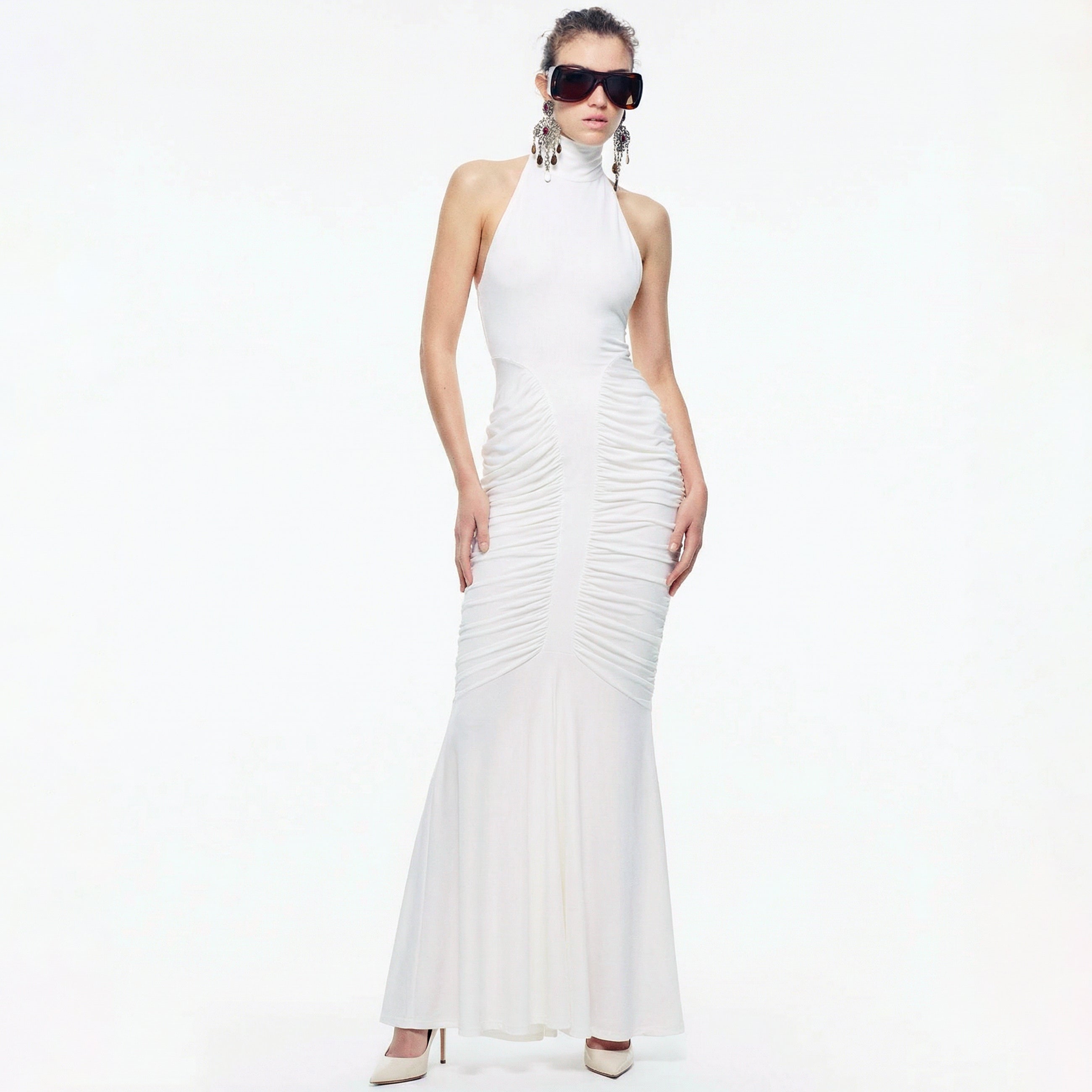 Abito lungo in jersey con drappeggi di colore bianco