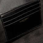 BÉA CLUTCH BAG in black calfskin box