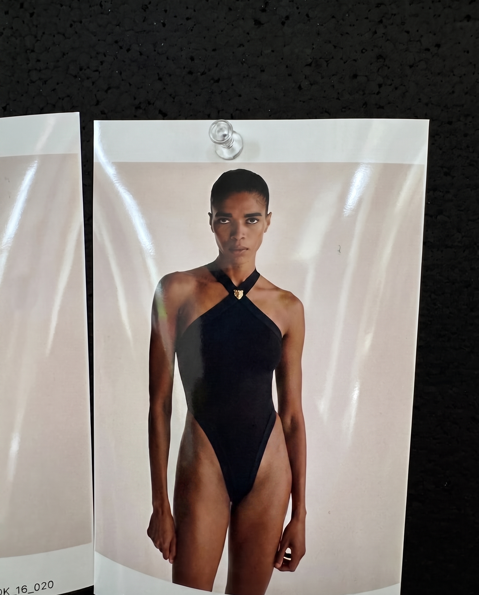 Black crossover neckline bodysuit